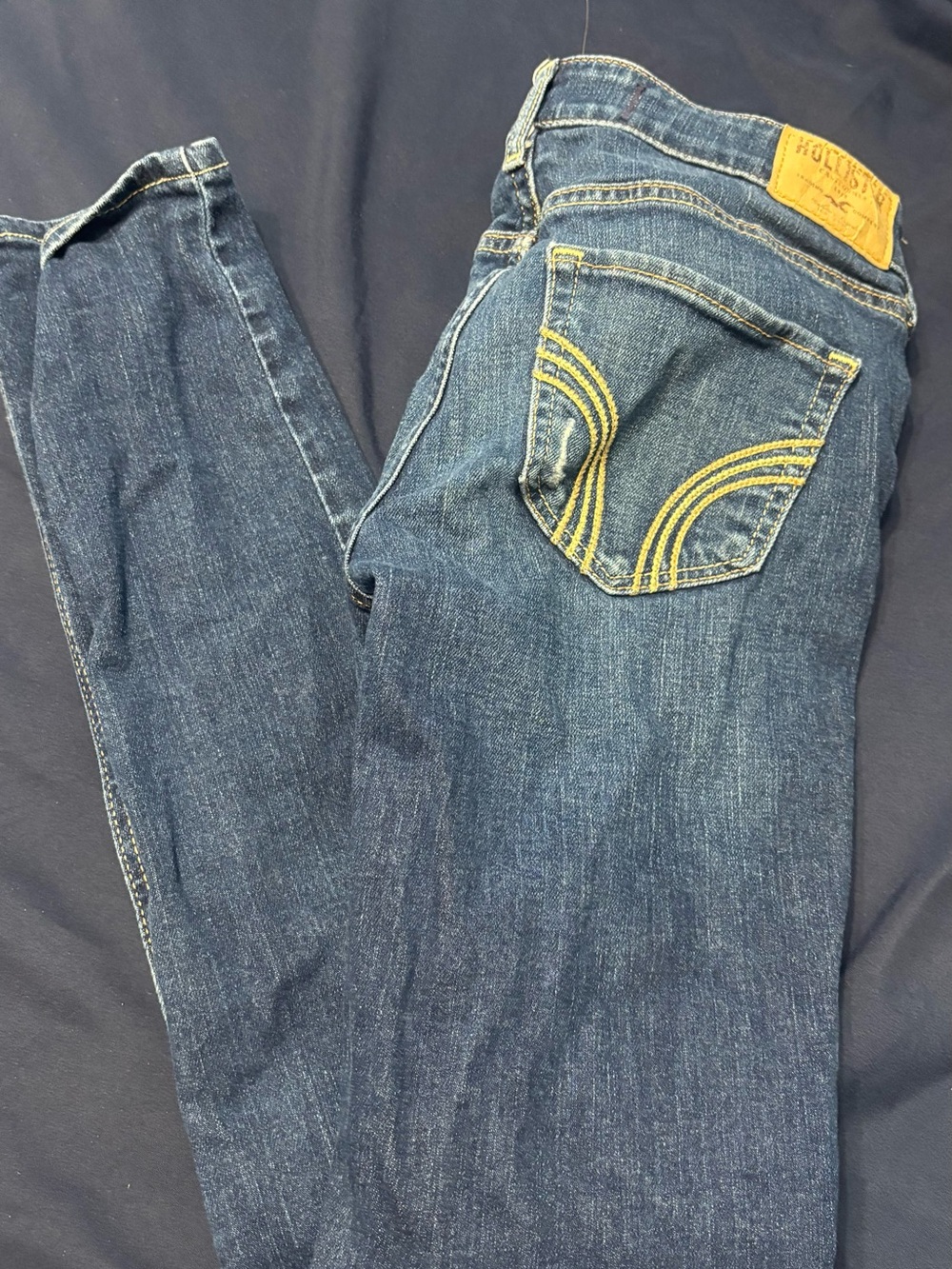 Hollister Dark Blue Jeans with Yellow Stitching